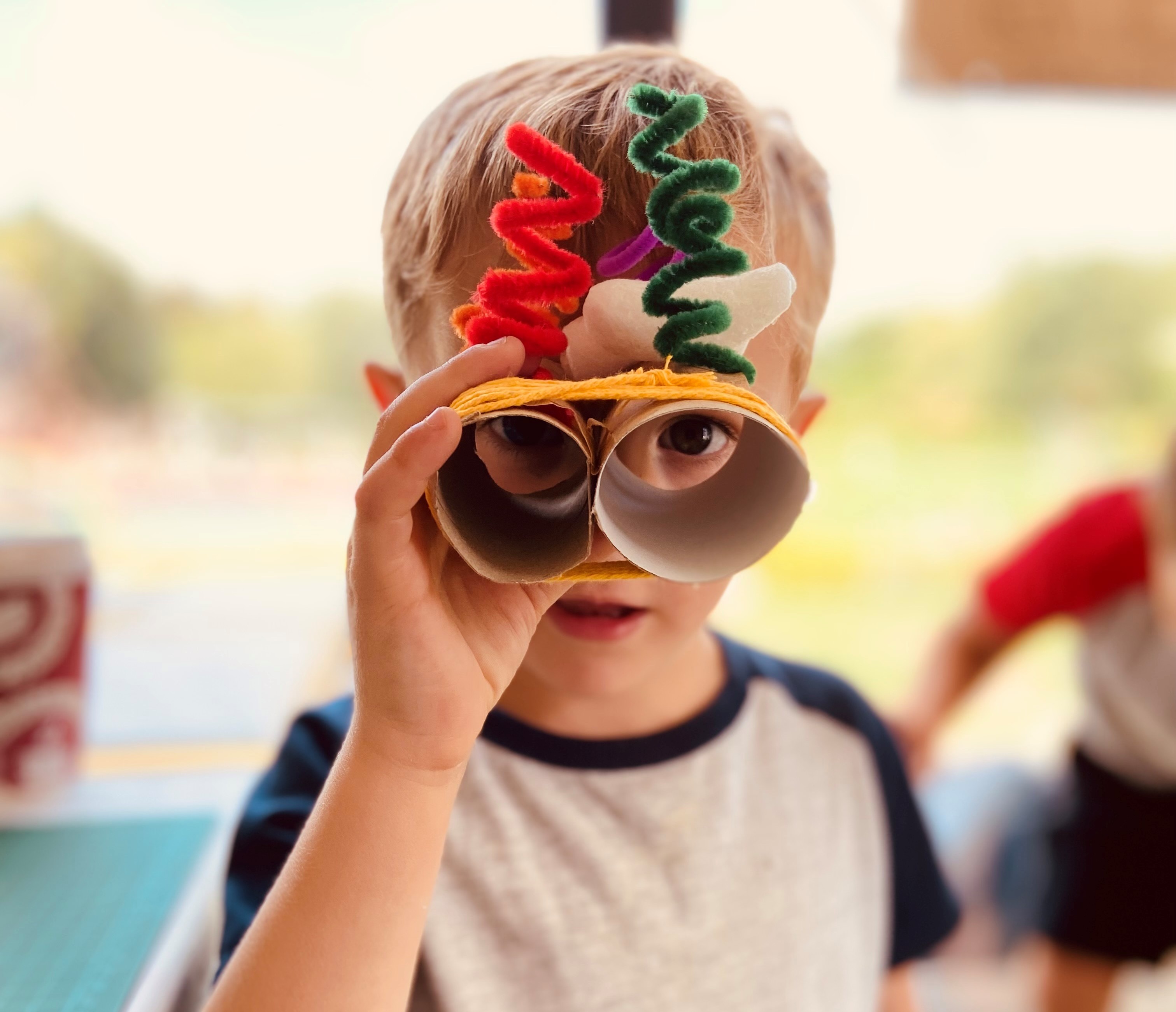 kid with craft